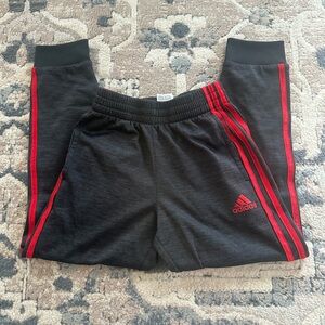 adidas Boys Black Joggers with Red Side Stripes